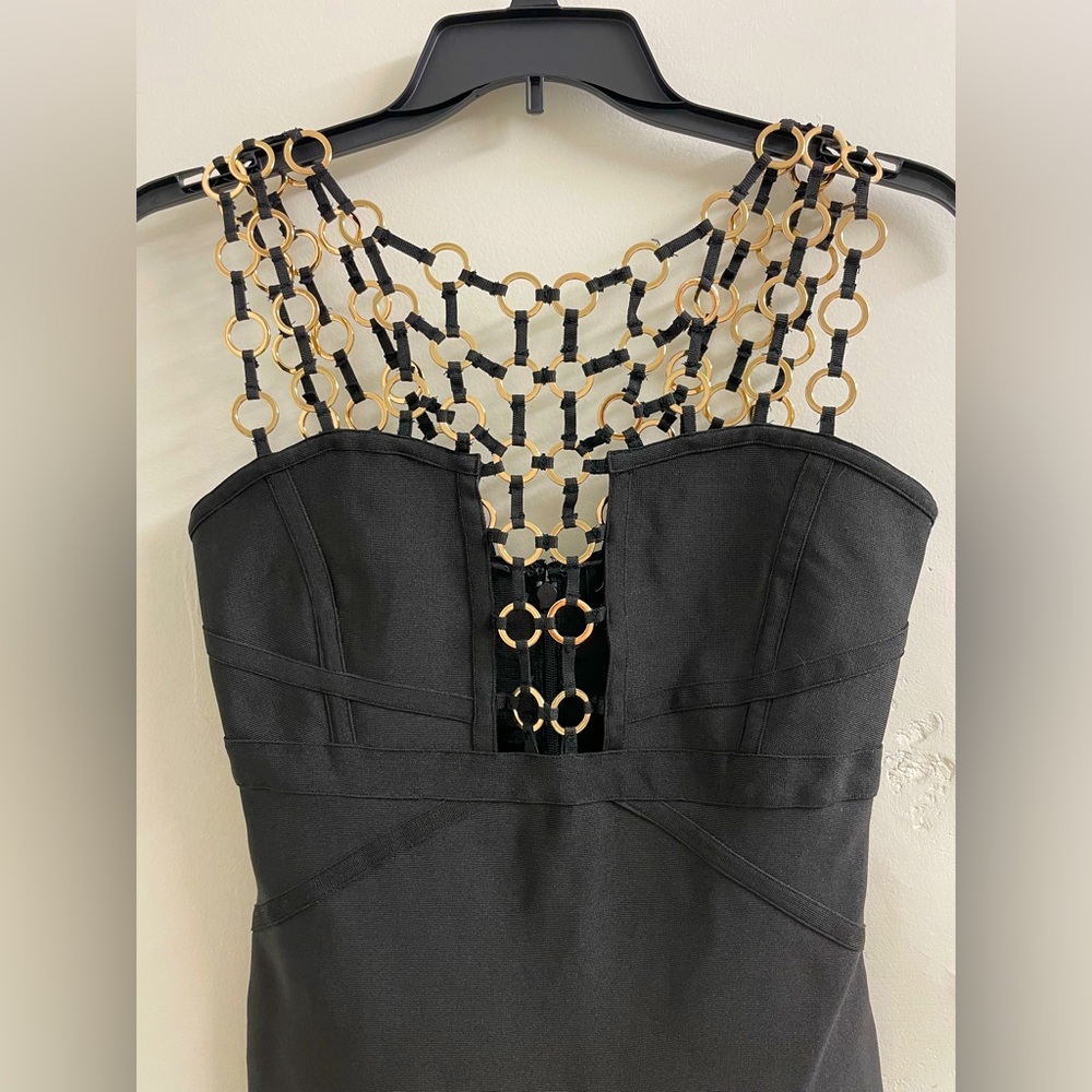 Elegant Black Backless Dress with Intricate Neckline - Picture 3 of 6